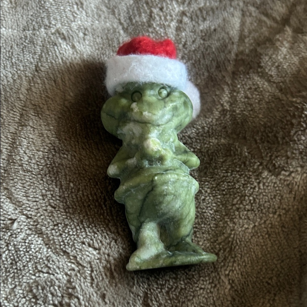 Festive Green Jade Grinch Figurine with Santa Hat